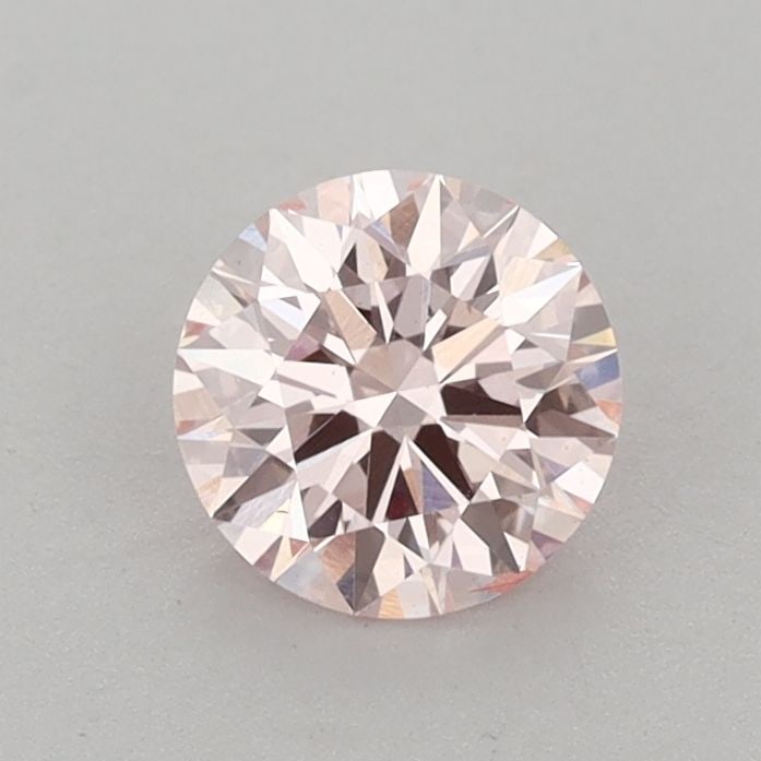Ideal Loose Diamond - ROUND 0.7ct Fancy Pink SI1: Ideal Loose Diamond - ROUND 0.7ct Fancy Pink SI1 Source: This is a real non-mined Diamond that has been grown in a lab Shape: ROUND Carats: 0.7 Color: Fancy Pink Certification: IGI Video: