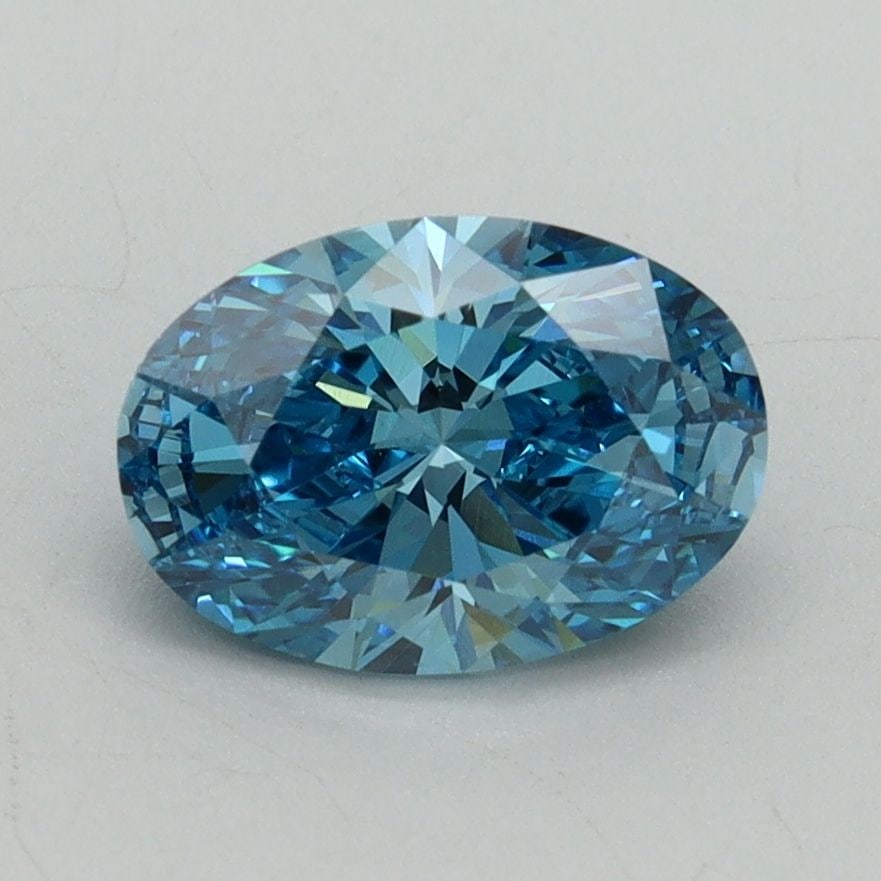 Loose Diamond - OVAL 1.41ct Fancy Vivid Blue VS1: Loose Diamond - OVAL 1.41ct Fancy Vivid Blue VS1 Source: This is a real non-mined Diamond that has been grown in a lab Shape: OVAL Carats: 1.41 Color: Fancy Vivid Blue Certification: IGI Video: