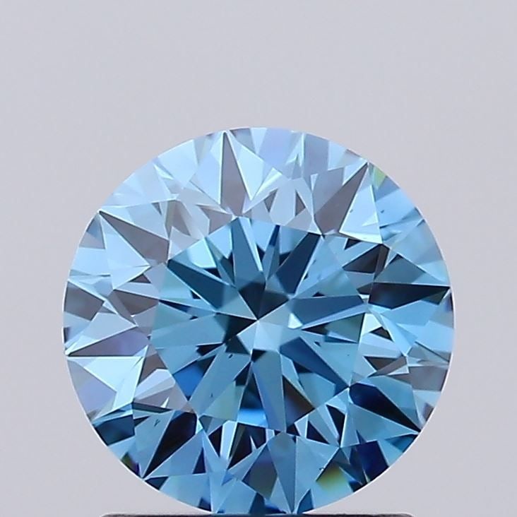 Loose Diamond - ROUND 1.23ct Fancy Vivid Blue VS1: Loose Diamond - ROUND 1.23ct Fancy Vivid Blue VS1 Source: This is a real non-mined Diamond that has been grown in a lab Shape: ROUND Carats: 1.23 Color: Fancy Vivid Blue Certification: IGI Video: