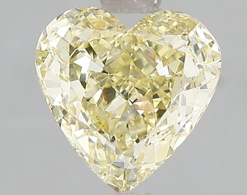 Loose Diamond - HEART 2.01ct Fancy Yellow SI1: Loose Diamond - HEART 2.01ct Fancy Yellow SI1 Source: This is a real non-mined Diamond that has been grown in a lab Shape: HEART Carats: 2.01 Color: Fancy Yellow Certification: IGI Video: