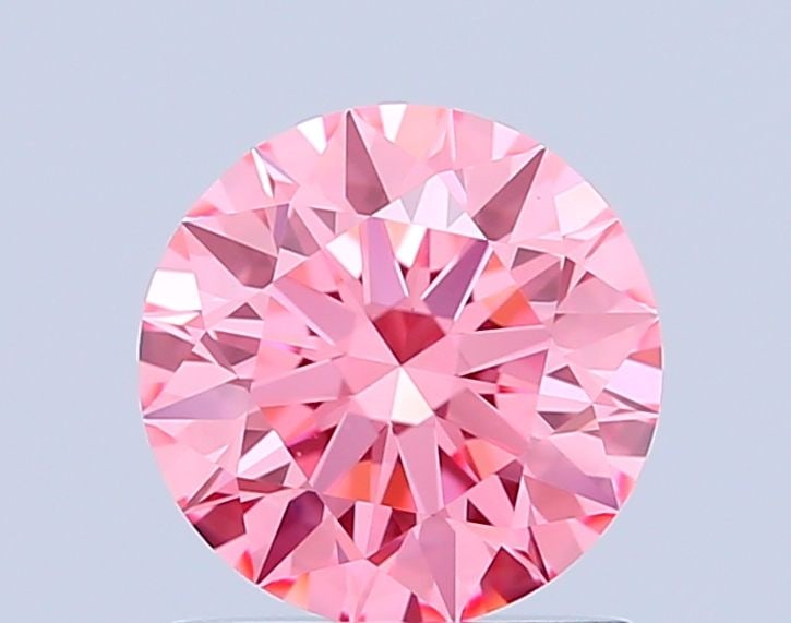 Ideal Loose Diamond - ROUND 1.09ct Fancy Vivid Pink VS1: Ideal Loose Diamond - ROUND 1.09ct Fancy Vivid Pink VS1 Source: This is a real non-mined Diamond that has been grown in a lab Shape: ROUND Carats: 1.09 Color: Fancy Vivid Pink Certification: IGI Video