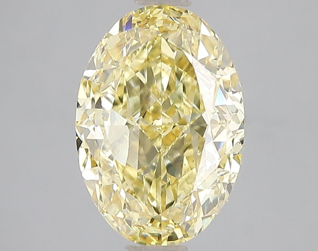 Loose Diamond - OVAL 3.56ct Fancy Vivid Yellow VS2: Loose Diamond - OVAL 3.56ct Fancy Vivid Yellow VS2 Source: This is a real non-mined Diamond that has been grown in a lab Shape: OVAL Carats: 3.56 Color: Fancy Vivid Yellow Certification: IGI Video:
