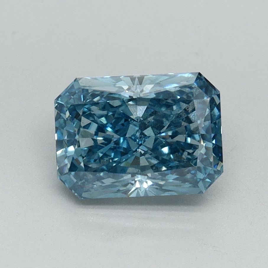 Loose Diamond - RADIANT 1.52ct Fancy Vivid Blue SI1: Loose Diamond - RADIANT 1.52ct Fancy Vivid Blue SI1 Source: This is a real non-mined Diamond that has been grown in a lab Shape: RADIANT Carats: 1.52 Color: Fancy Vivid Blue Certification: IGI Video: