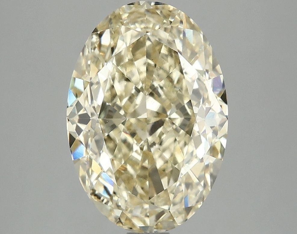 Loose Diamond - OVAL 4.05ct Fancy Intense Yellow VVS2: Loose Diamond - OVAL 4.05ct Fancy Intense Yellow VVS2 Source: This is a real non-mined Diamond that has been grown in a lab Shape: OVAL Carats: 4.05 Color: Fancy Intense Yellow Certification: IGI Vide