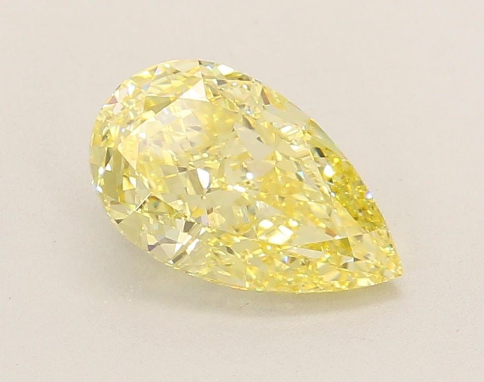 Loose Diamond - PEAR 2.14ct Fancy Intense Yellow VVS2: Loose Diamond - PEAR 2.14ct Fancy Intense Yellow VVS2 Source: This is a real non-mined Diamond that has been grown in a lab Shape: PEAR Carats: 2.14 Color: Fancy Intense Yellow Certification: IGI Vide