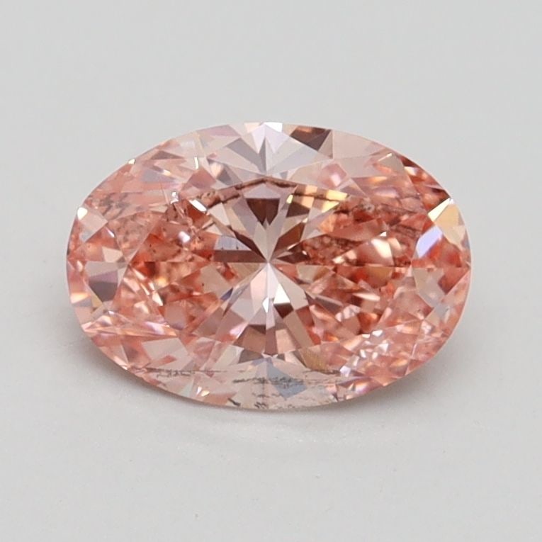 Loose Diamond - OVAL 0.93ct Fancy Vivid Pink SI1: Loose Diamond - OVAL 0.93ct Fancy Vivid Pink SI1 Source: This is a real non-mined Diamond that has been grown in a lab Shape: OVAL Carats: 0.93 Color: Fancy Vivid Pink Certification: IGI Video: