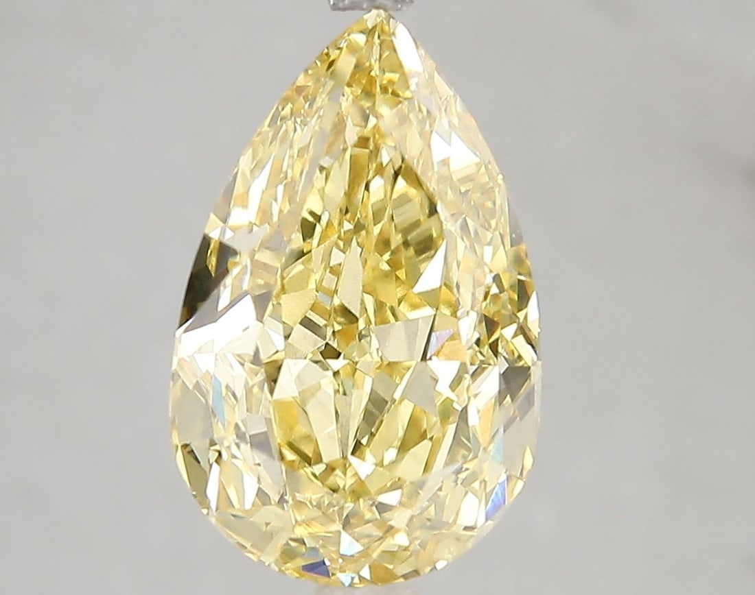 Loose Diamond - PEAR 5.02ct Fancy Vivid Yellow SI1: Loose Diamond - PEAR 5.02ct Fancy Vivid Yellow SI1 Source: This is a real non-mined Diamond that has been grown in a lab Shape: PEAR Carats: 5.02 Color: Fancy Vivid Yellow Certification: IGI Video: