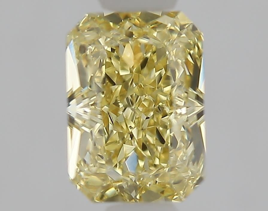 Loose Diamond - RADIANT 1.02ct Fancy Yellow VS1: Loose Diamond - RADIANT 1.02ct Fancy Yellow VS1 Source: This is a real non-mined Diamond that has been grown in a lab Shape: RADIANT Carats: 1.02 Color: Fancy Yellow Certification: IGI Video:
