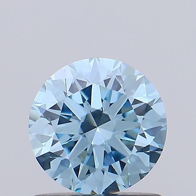 Loose Diamond - ROUND 0.93ct Fancy Vivid Blue VS1: Loose Diamond - ROUND 0.93ct Fancy Vivid Blue VS1 Source: This is a real non-mined Diamond that has been grown in a lab Shape: ROUND Carats: 0.93 Color: Fancy Vivid Blue Certification: IGI Video: