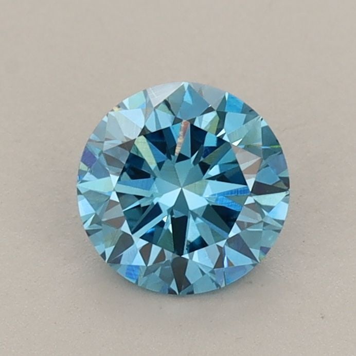 Loose Diamond - ROUND 0.72ct Fancy Vivid Blue VS2: Loose Diamond - ROUND 0.72ct Fancy Vivid Blue VS2 Source: This is a real non-mined Diamond that has been grown in a lab Shape: ROUND Carats: 0.72 Color: Fancy Vivid Blue Certification: IGI Video: