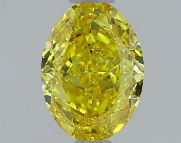 Loose Diamond - OVAL 1.05ct Fancy Vivid Yellow VVS2: Loose Diamond - OVAL 1.05ct Fancy Vivid Yellow VVS2 Source: This is a real non-mined Diamond that has been grown in a lab Shape: OVAL Carats: 1.05 Color: Fancy Vivid Yellow Certification: IGI Video: