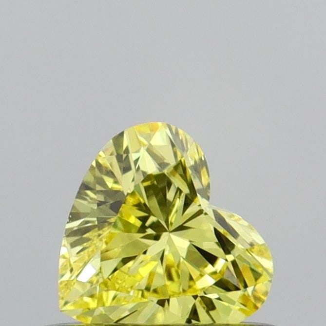 Loose Diamond - HEART 0.34ct Fancy Vivid Yellow VS1: Loose Diamond - HEART 0.34ct Fancy Vivid Yellow VS1 Source: This is a real non-mined Diamond that has been grown in a lab Shape: HEART Carats: 0.34 Color: Fancy Vivid Yellow Certification: IGI Video: