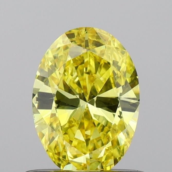 Loose Diamond - OVAL 0.58ct Fancy Vivid Yellow VS1: Loose Diamond - OVAL 0.58ct Fancy Vivid Yellow VS1 Source: This is a real non-mined Diamond that has been grown in a lab Shape: OVAL Carats: 0.58 Color: Fancy Vivid Yellow Certification: IGI Video: