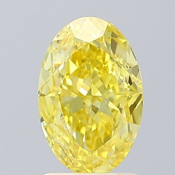 Loose Diamond - OVAL 1.7ct Fancy Vivid Yellow VS1: Loose Diamond - OVAL 1.7ct Fancy Vivid Yellow VS1 Source: This is a real non-mined Diamond that has been grown in a lab Shape: OVAL Carats: 1.7 Color: Fancy Vivid Yellow Certification: IGI Video: