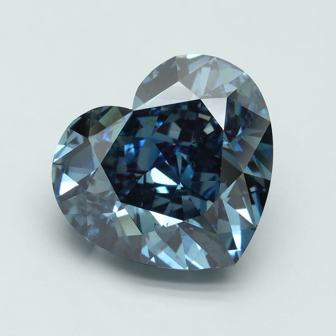 Loose Diamond - HEART 11.36ct Fancy Vivid Blue SI1: Loose Diamond - HEART 11.36ct Fancy Vivid Blue SI1 Source: This is a real non-mined Diamond that has been grown in a lab Shape: HEART Carats: 11.36 Color: Fancy Vivid Blue Certification: IGI Video: