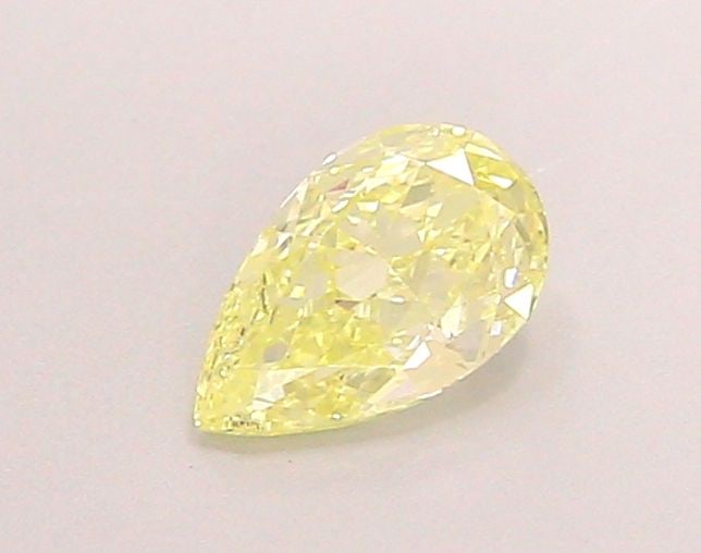 Loose Diamond - PEAR 0.44ct Fancy Yellow VVS2: Loose Diamond - PEAR 0.44ct Fancy Yellow VVS2 Source: This is a real non-mined Diamond that has been grown in a lab Shape: PEAR Carats: 0.44 Color: Fancy Yellow Certification: IGI Video: