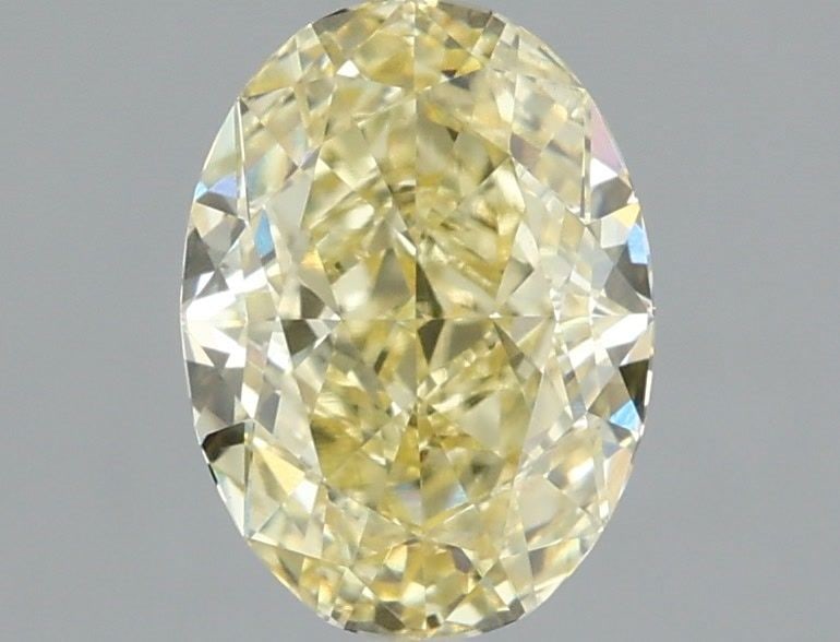 Loose Diamond - OVAL 1.6ct Fancy Yellow VS1: Loose Diamond - OVAL 1.6ct Fancy Yellow VS1 Source: This is a real non-mined Diamond that has been grown in a lab Shape: OVAL Carats: 1.6 Color: Fancy Yellow Certification: IGI Video: