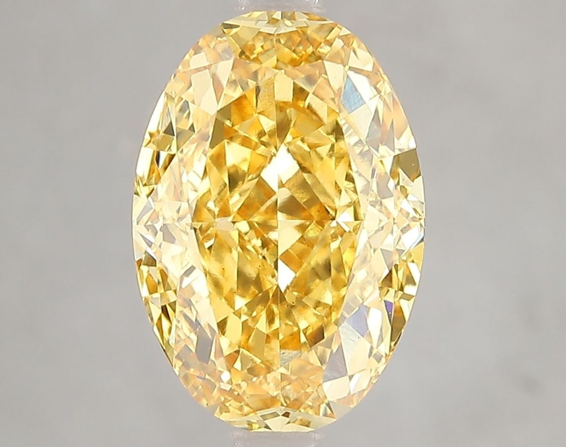 Loose Diamond - OVAL 4.61ct Fancy Vivid Yellow VS1: Loose Diamond - OVAL 4.61ct Fancy Vivid Yellow VS1 Source: This is a real non-mined Diamond that has been grown in a lab Shape: OVAL Carats: 4.61 Color: Fancy Vivid Yellow Certification: IGI Video:
