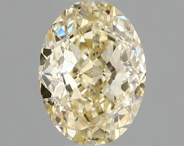 Loose Diamond - OVAL 1.05ct Fancy Yellow VVS2: Loose Diamond - OVAL 1.05ct Fancy Yellow VVS2 Source: This is a real non-mined Diamond that has been grown in a lab Shape: OVAL Carats: 1.05 Color: Fancy Yellow Certification: IGI Video: