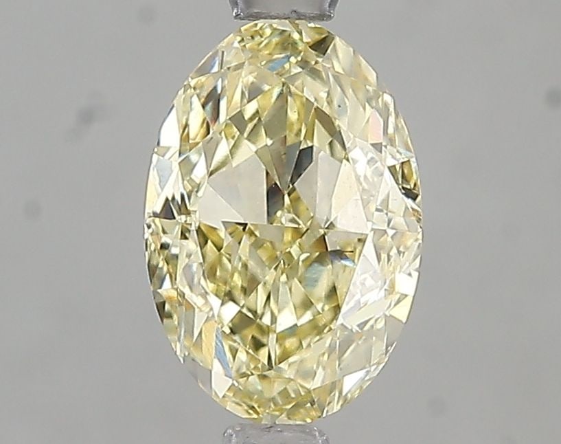 Loose Diamond - OVAL 1.5ct Fancy Intense Yellow VS2: Loose Diamond - OVAL 1.5ct Fancy Intense Yellow VS2 Source: This is a real non-mined Diamond that has been grown in a lab Shape: OVAL Carats: 1.5 Color: Fancy Intense Yellow Certification: IGI Video: