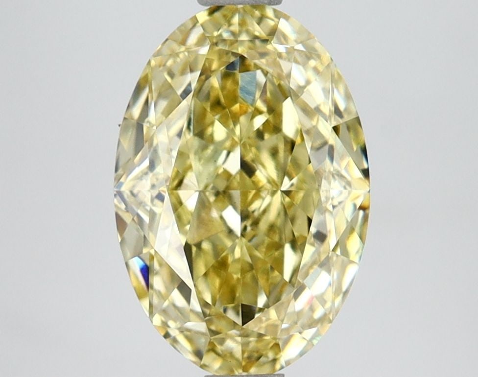 Loose Diamond - OVAL 2.54ct Fancy Vivid Yellow VS1: Loose Diamond - OVAL 2.54ct Fancy Vivid Yellow VS1 Source: This is a real non-mined Diamond that has been grown in a lab Shape: OVAL Carats: 2.54 Color: Fancy Vivid Yellow Certification: IGI Video: