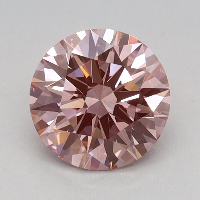 Loose Diamond - ROUND 0.7ct Fancy Vivid Pink VS1: Loose Diamond - ROUND 0.7ct Fancy Vivid Pink VS1 Source: This is a real non-mined Diamond that has been grown in a lab Shape: ROUND Carats: 0.7 Color: Fancy Vivid Pink Certification: IGI Video: