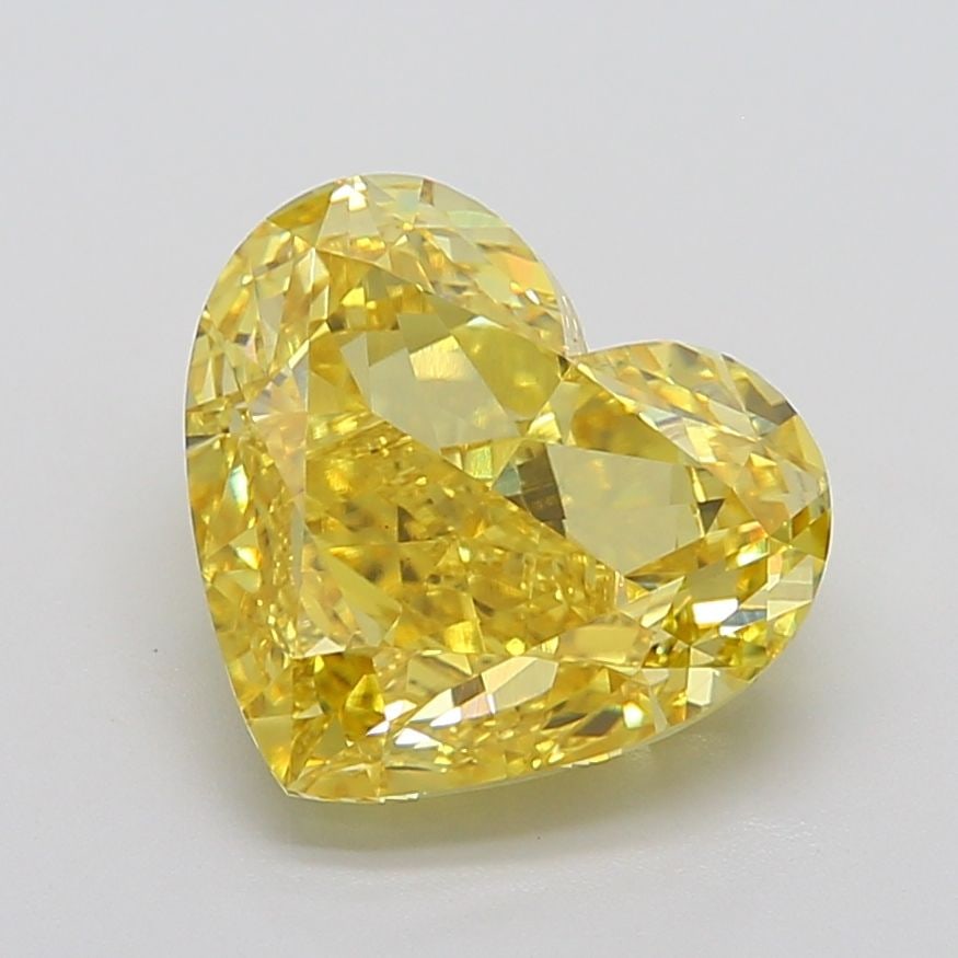Loose Diamond - HEART 7.91ct Fancy Vivid Yellow VS1: Loose Diamond - HEART 7.91ct Fancy Vivid Yellow VS1 Source: This is a real non-mined Diamond that has been grown in a lab Shape: HEART Carats: 7.91 Color: Fancy Vivid Yellow Certification: IGI Video: