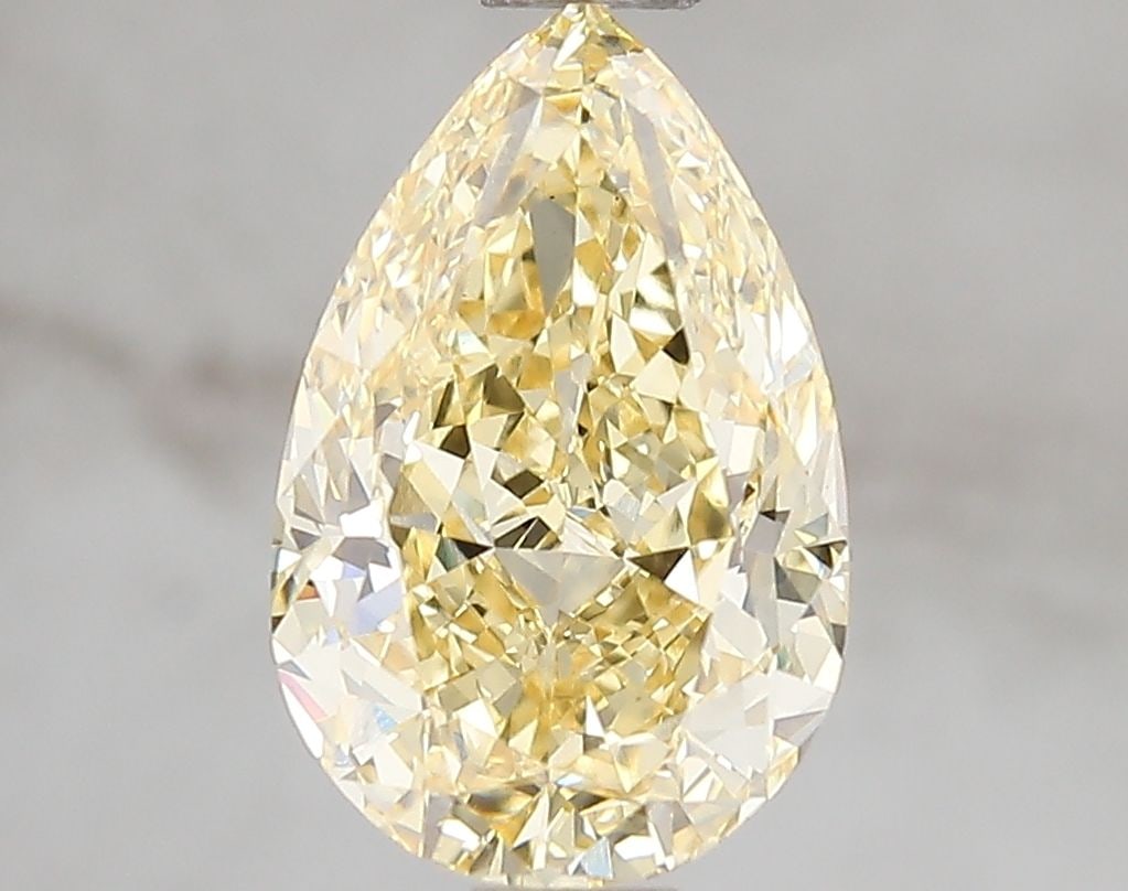 Loose Diamond - PEAR 2.6ct Fancy Intense Yellow VS1: Loose Diamond - PEAR 2.6ct Fancy Intense Yellow VS1 Source: This is a real non-mined Diamond that has been grown in a lab Shape: PEAR Carats: 2.6 Color: Fancy Intense Yellow Certification: IGI Video: