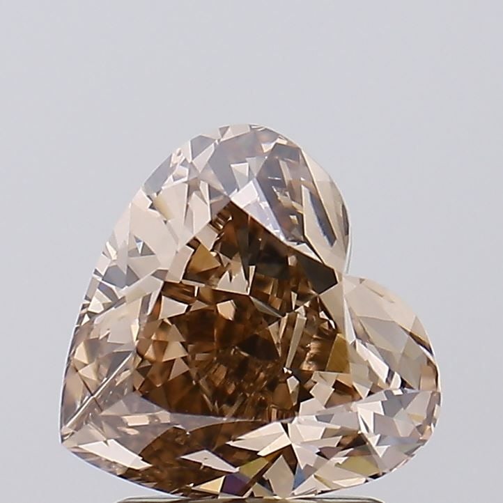 Loose Diamond - HEART 1.96ct Fancy Brown VS1: Loose Diamond - HEART 1.96ct Fancy Brown VS1 Source: This is a real non-mined Diamond that has been grown in a lab Shape: HEART Carats: 1.96 Color: Fancy Brown Certification: NONE Video: