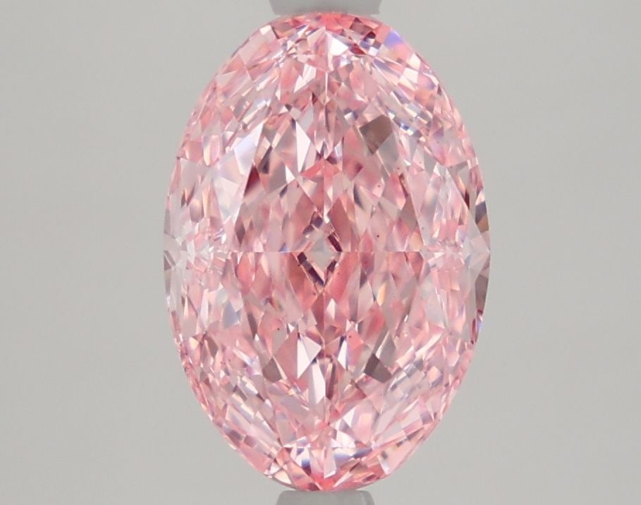 Loose Diamond - OVAL 2.33ct Fancy Vivid Pink VS1: Loose Diamond - OVAL 2.33ct Fancy Vivid Pink VS1 Source: This is a real non-mined Diamond that has been grown in a lab Shape: OVAL Carats: 2.33 Color: Fancy Vivid Pink Certification: IGI Video:
