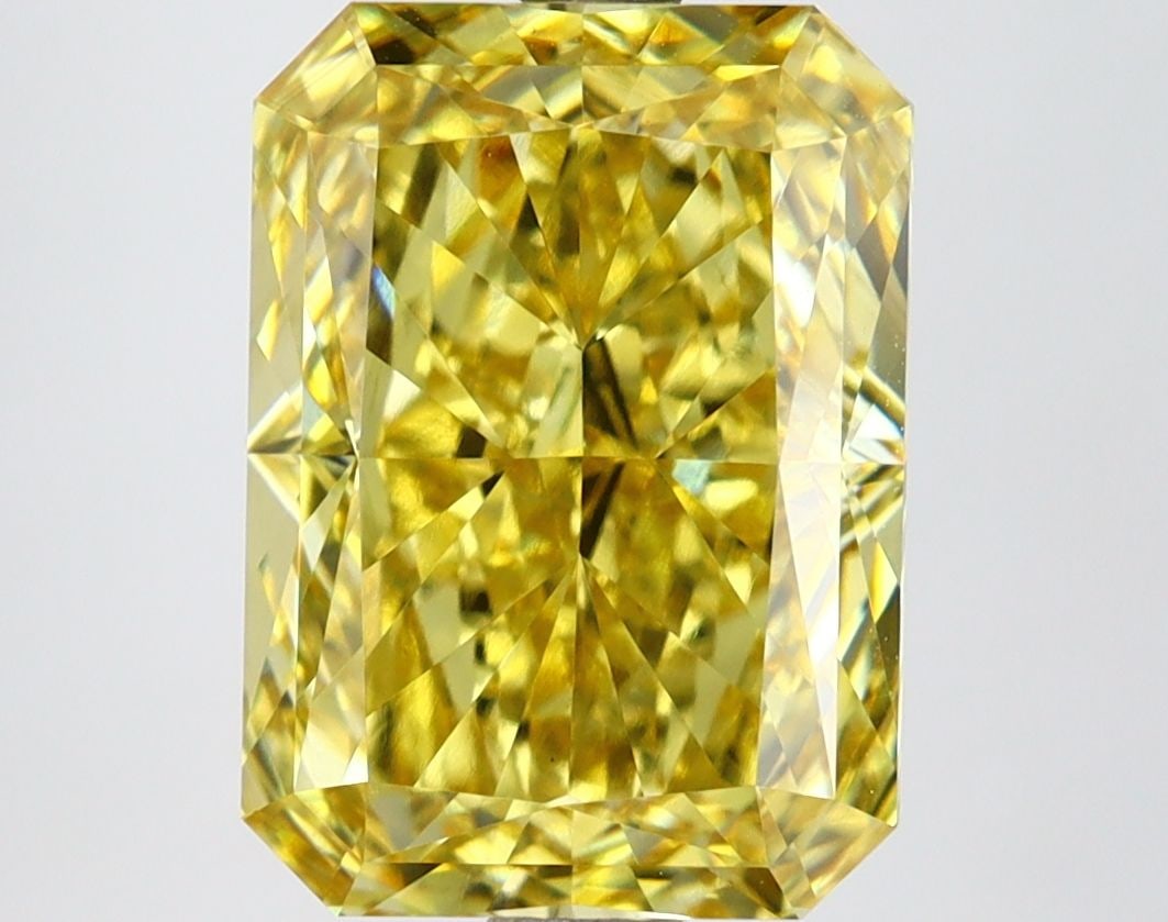 Loose Diamond - RADIANT 4.94ct Fancy Vivid Yellow VS1: Loose Diamond - RADIANT 4.94ct Fancy Vivid Yellow VS1 Source: This is a real non-mined Diamond that has been grown in a lab Shape: RADIANT Carats: 4.94 Color: Fancy Vivid Yellow Certification: IGI Vid