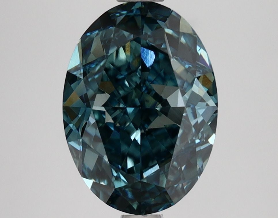 Loose Diamond - OVAL 3.1ct Fancy Vivid Green Blue VS1: Loose Diamond - OVAL 3.1ct Fancy Vivid Green Blue VS1 Source: This is a real non-mined Diamond that has been grown in a lab Shape: OVAL Carats: 3.1 Color: Fancy Vivid Green Blue Certification: IGI Vid