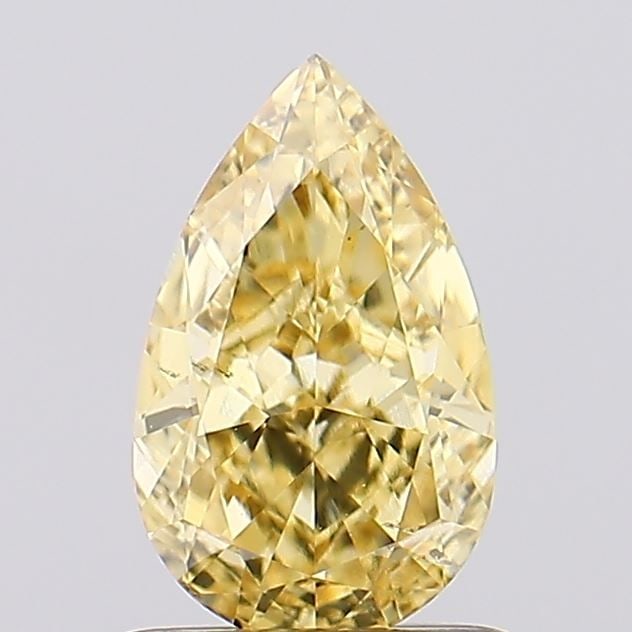 Loose Diamond - PEAR 1.06ct Fancy Intense Yellow VS2: Loose Diamond - PEAR 1.06ct Fancy Intense Yellow VS2 Source: This is a real non-mined Diamond that has been grown in a lab Shape: PEAR Carats: 1.06 Color: Fancy Intense Yellow Certification: IGI Video