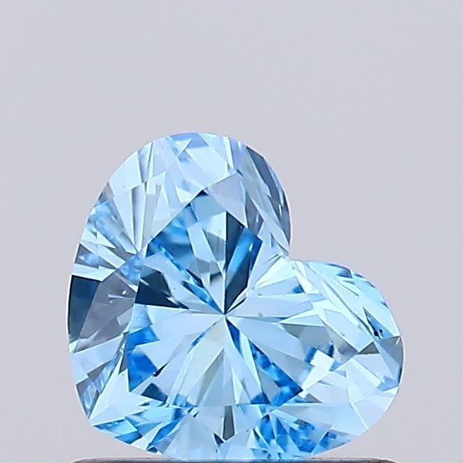 Loose Diamond - HEART 0.68ct Fancy Vivid Blue VS1: Loose Diamond - HEART 0.68ct Fancy Vivid Blue VS1 Source: This is a real non-mined Diamond that has been grown in a lab Shape: HEART Carats: 0.68 Color: Fancy Vivid Blue Certification: IGI Video: