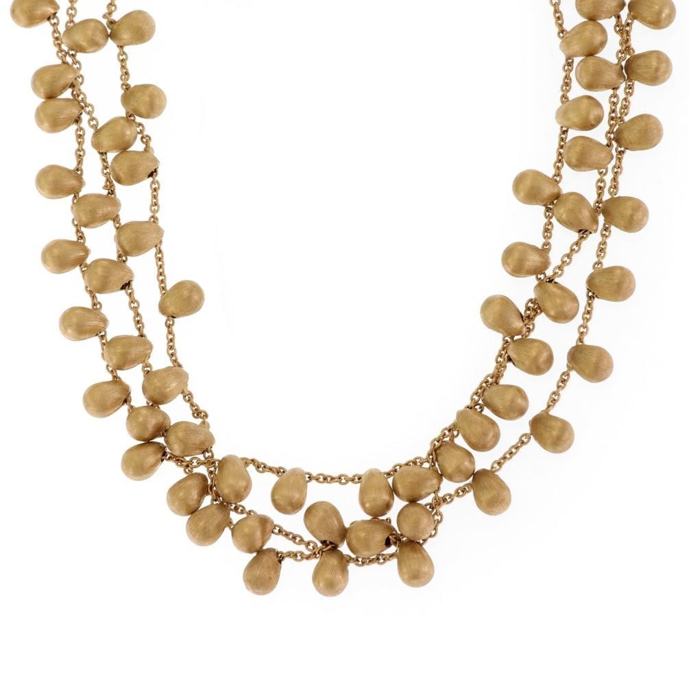 Marco Bicego Siviglia 18k Yellow Gold Triple Strand Necklace: Marco Bicego Siviglia 18k Yellow Gold Triple Strand Necklace Discover the elegance of this authentic Marco Bicego triple strand necklace from the Siviglia Collection. Crafted from luxurious 18k yellow