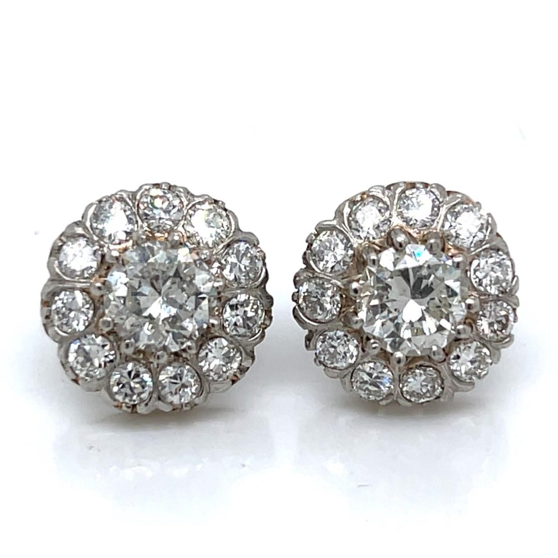 Art Deco Platinum Diamond Cluster Earrings 4.40 Ct I-J SI2-I1 G-H VVS-VS: Art Deco Platinum Diamond Cluster Earrings 4.40 Ct I-J SI2-I1 G-H VVS-VS Discover the elegance of these Art Deco Platinum Diamond Cluster Earrings, featuring a stunning total diamond weight of 4.40 Ct