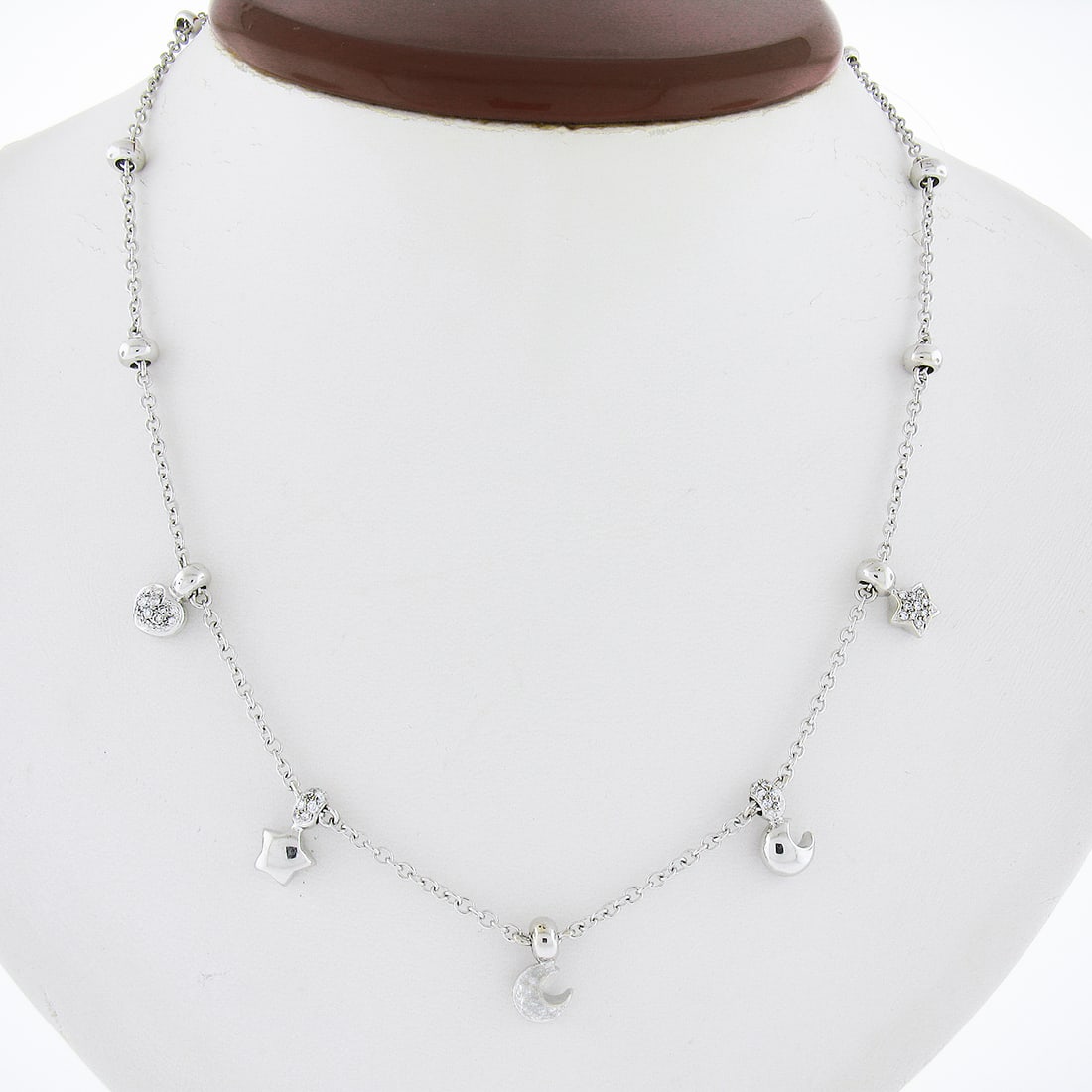 Pasquale Bruni 18k White Gold 16" Celestial Charm Necklace with Diamonds and Sapphire: Pasquale Bruni 18k White Gold 16" Celestial Charm Necklace with Diamonds and Sapphire This exquisite necklace features an elegant design crafted from solid 18k white gold, showcasing a beautiful