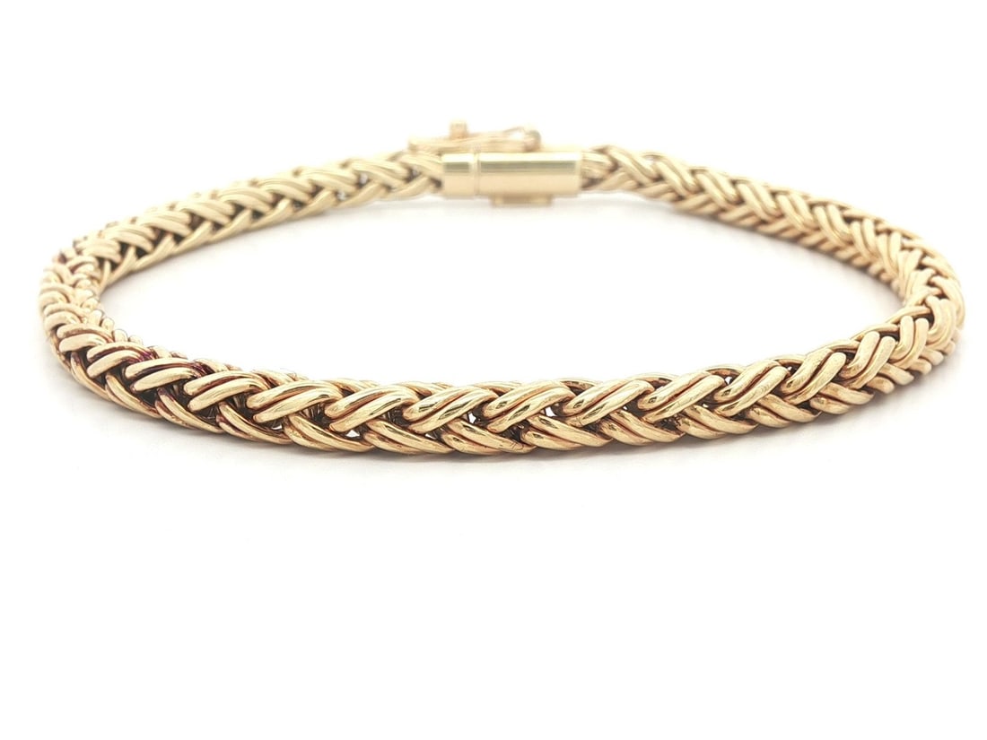 Tiffany & Co. 18k Yellow Gold Wheat Link Bracelet with Box: Tiffany & Co. 18k Yellow Gold Wheat Link Bracelet with Box This exquisite Tiffany & Co. bracelet showcases a captivating design with its fancy wheat link chain, crafted from solid 18k yellow gold. It