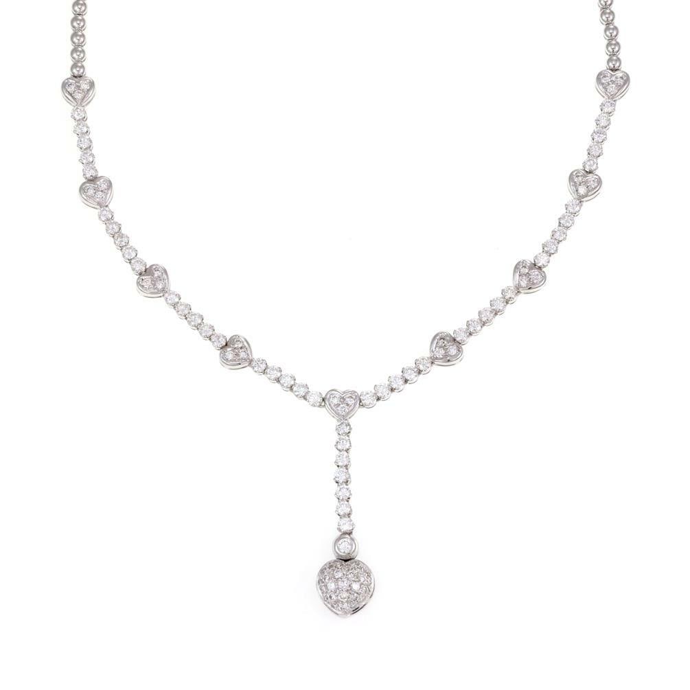 18k White Gold Diamond Lariat Heart Necklace 3.5ct Italy: 18k White Gold Diamond Lariat Heart Necklace 3.5ct Italy This exquisite diamond lariat necklace is crafted from 18k white gold with a high polished finish. It features a captivating centerpiece adorne