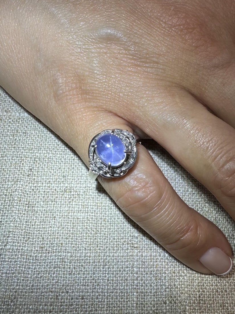 5.18ct GIA Certified Star Sapphire Platinum Cocktail Ring with Diamonds: 5.18ct GIA Certified Star Sapphire Platinum Cocktail Ring with Diamonds This exquisite petite cocktail ring showcases a stunning 5.18 ct GIA certified natural star sapphire, featuring an oval double c