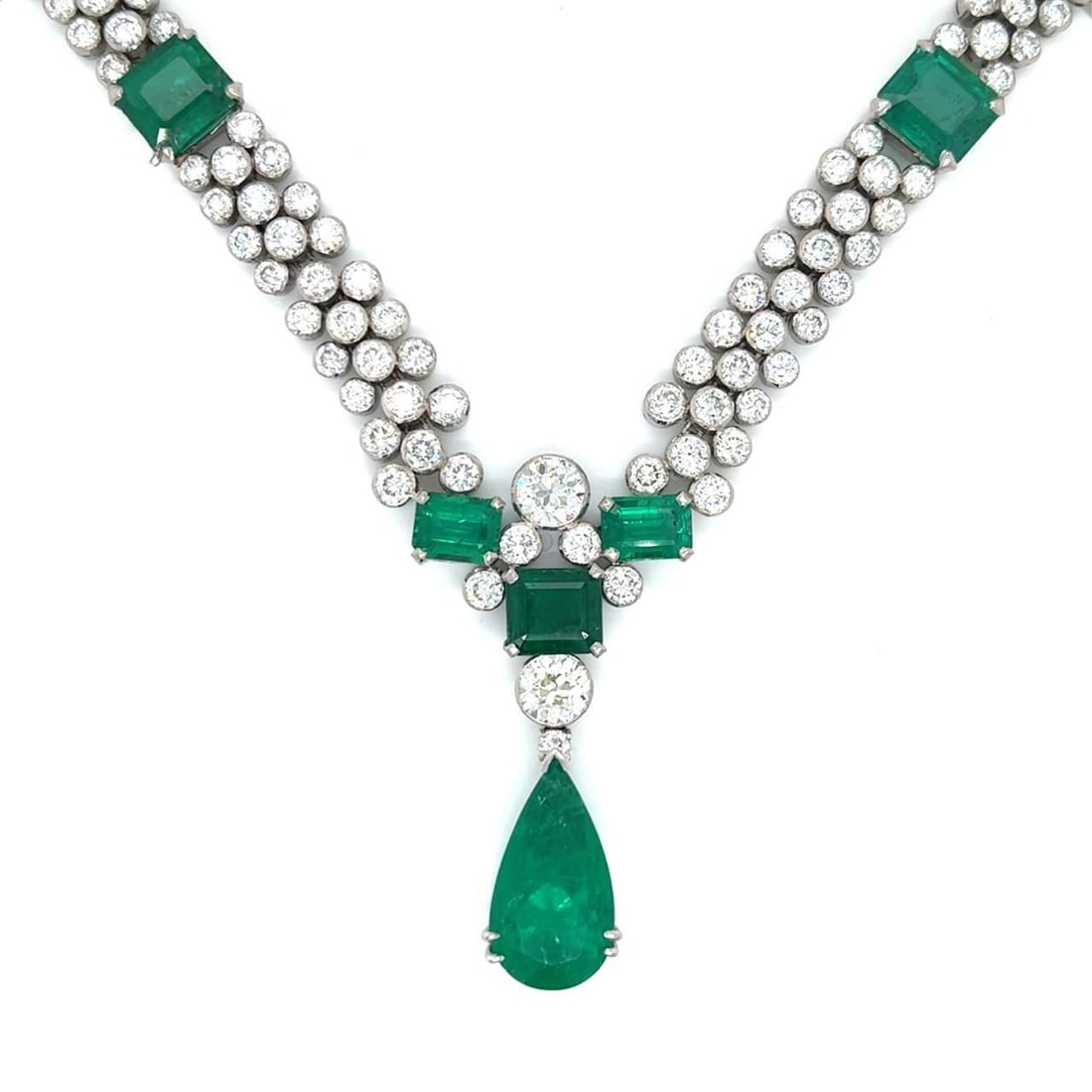 Art Deco GIA Certified Emerald Diamond Necklace 11.16 Ct 30 Ct: Art Deco GIA Certified Emerald Diamond Necklace 11.16 Ct 30 Ct This stunning Art Deco necklace features a GIA Certified Colombian emerald weighing 11.16 Ct, complemented by 11 additional Colombian eme