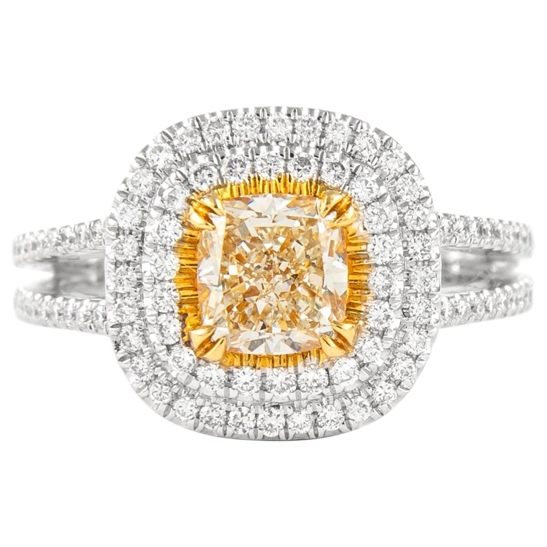 1.58ct Fancy Yellow VS2 Diamond Double Halo Ring 18k Gold: 1.58ct Fancy Yellow VS2 Diamond Double Halo Ring 18k Gold This exquisite 1.58ctt Fancy Yellow VS2 Diamond Double Halo Ring features a striking design crafted in 18k two-tone gold. The ring showcases a