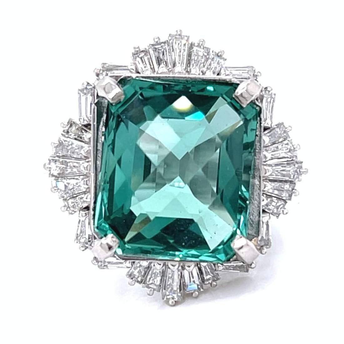 Elegant Platinum Diamond and Quartz Ring 21.18 Ct Centerpiece: Elegant Platinum Diamond and Quartz Ring 21.18 Ct Centerpiece This stunning Platinum Diamond & Quartz Ring features a remarkable 21.18 Ct. Quartz centerpiece, complemented by 2.03 Ct. of dazzling diam