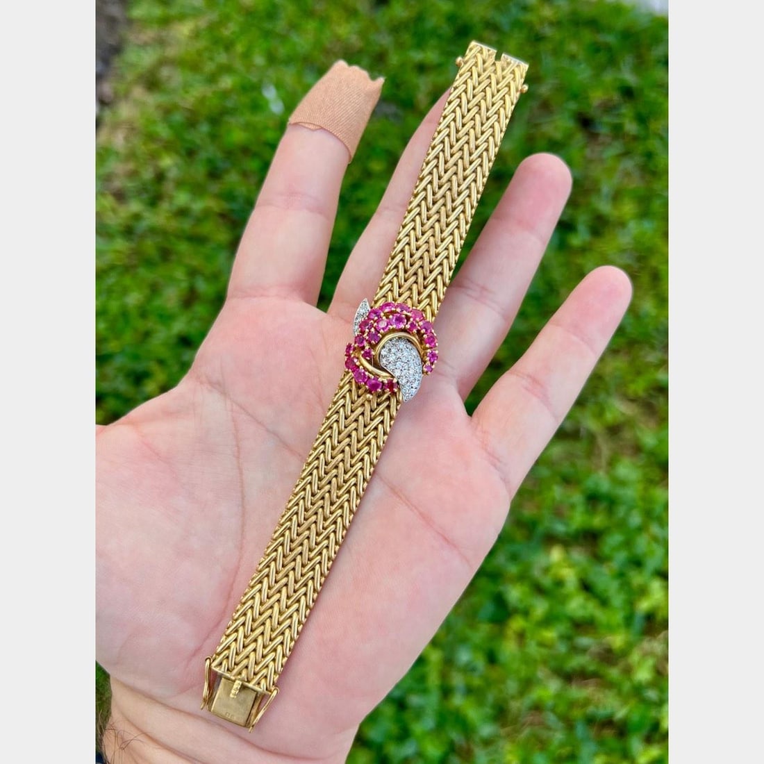 JOSARN 1960s 18K Yellow Gold Ruby Diamond Watch 3.00 Ct Rubies 1.10 Ct Diamonds: JOSARN 1960s 18K Yellow Gold Ruby Diamond Watch 3.00 Ct Rubies 1.10 Ct Diamonds This exquisite 1960's watch is crafted from 18K yellow gold and features a stunning arrangement of 20 Burma no-heat