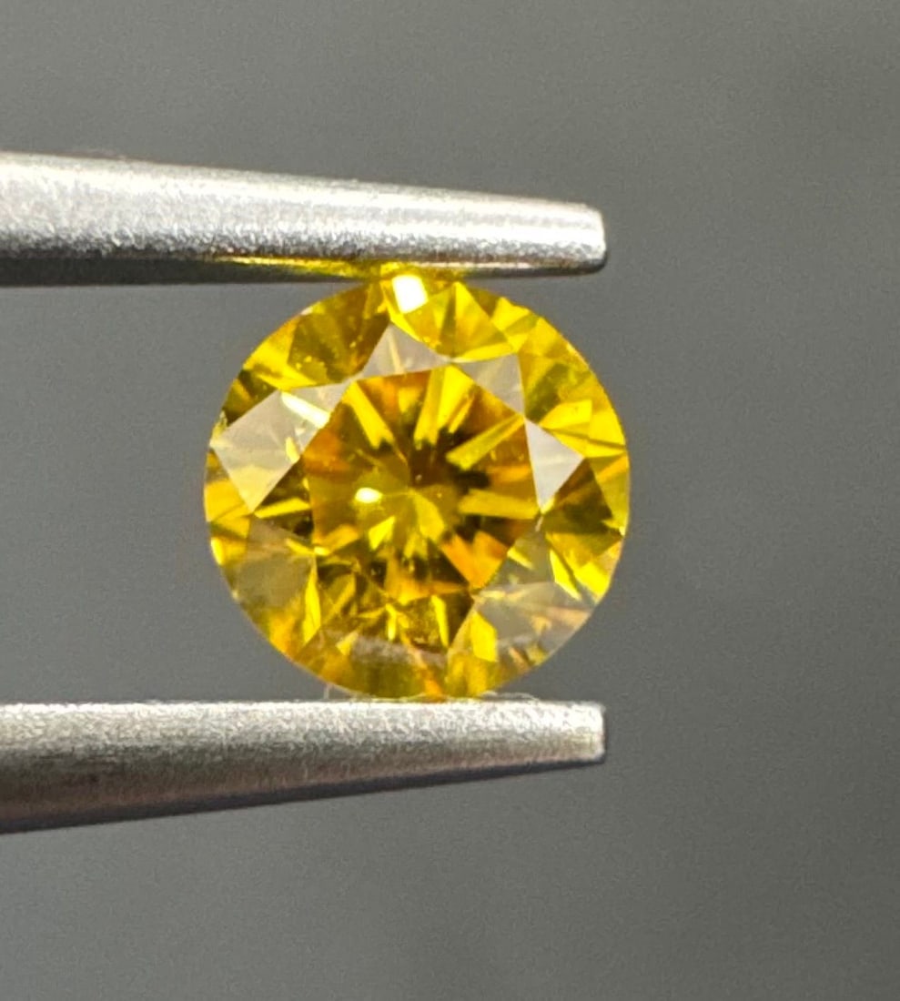 Loose Diamond - ROUND 0.23ct Fancy Vivid Yellow SI2: Loose Diamond - ROUND 0.23ct Fancy Vivid Yellow SI2 Source: Natural Shape: ROUND Carats: 0.23 Color: Fancy Vivid Yellow Certification: GIA PLEASE NOTE: Framed, Large, or heavy items do not have shippi