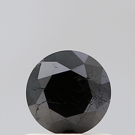 Loose Diamond - ROUND 0.6ct Fancy Black VS2: Loose Diamond - ROUND 0.6ct Fancy Black VS2 Source: Natural Shape: ROUND Carats: 0.6 Color: Fancy Black Certification: NONE Video: