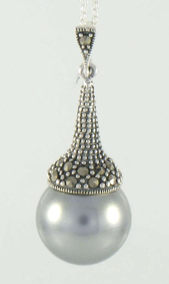 Tahitian Gray Pearl Marcasite Sterling Silver Pendant with 18 Inch Chain: Tahitian Gray Pearl Marcasite Sterling Silver Pendant with 18 Inch Chain This exquisite pendant showcases a stunning combination of marcasite and a cultured Tahitian gray pearl, set in high-quality st