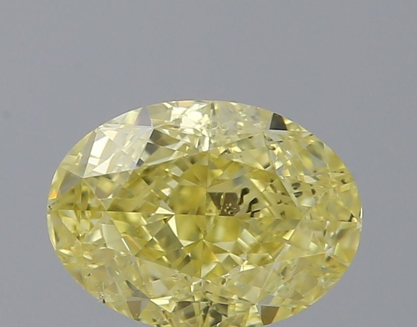 Loose Diamond - OVAL 1.01ct Fancy Intense Yellow SI2: Loose Diamond - OVAL 1.01ct Fancy Intense Yellow SI2 Source: Natural Shape: OVAL Carats: 1.01 Color: Fancy Intense Yellow Certification: GIA Video: