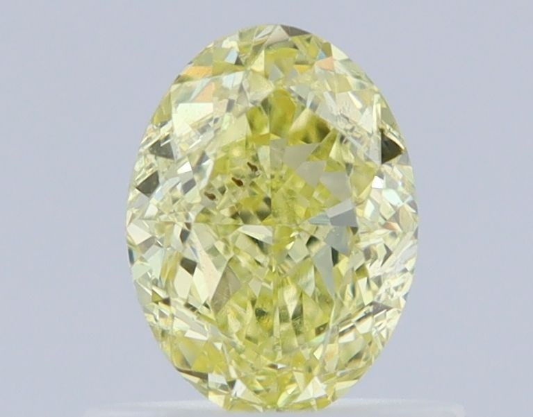 Loose Diamond - OVAL 0.7ct Fancy Yellow SI1: Loose Diamond - OVAL 0.7ct Fancy Yellow SI1 Source: Natural Shape: OVAL Carats: 0.7 Color: Fancy Yellow Certification: GIA Video: