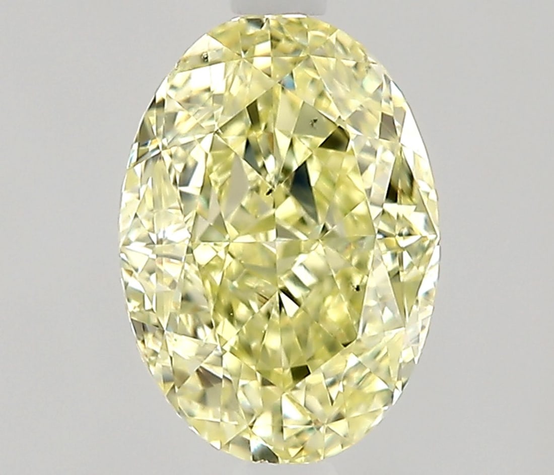 Loose Diamond - OVAL 0.9ct Fancy Light Yellow VS2: Loose Diamond - OVAL 0.9ct Fancy Light Yellow VS2 Source: Natural Shape: OVAL Carats: 0.9 Color: Fancy Light Yellow Certification: GIA Video: